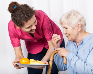 caregiver assisting patient on reading